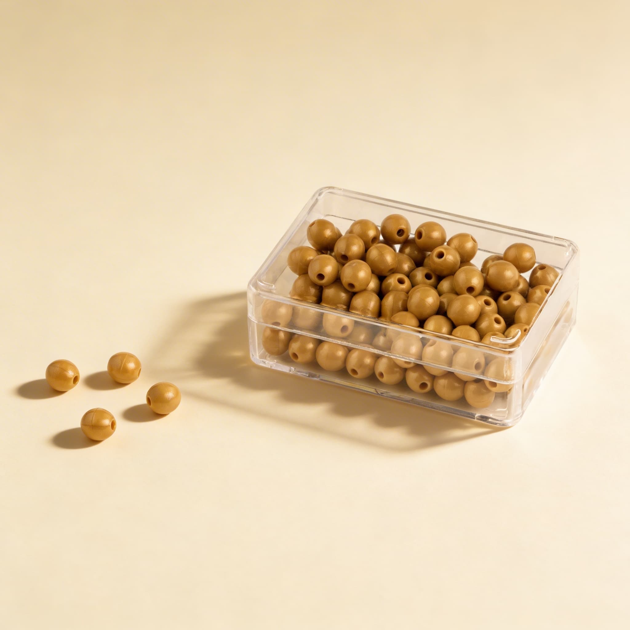 100 goldene Perleneinheiten: Einzelperlen Nylon (mit Loch)