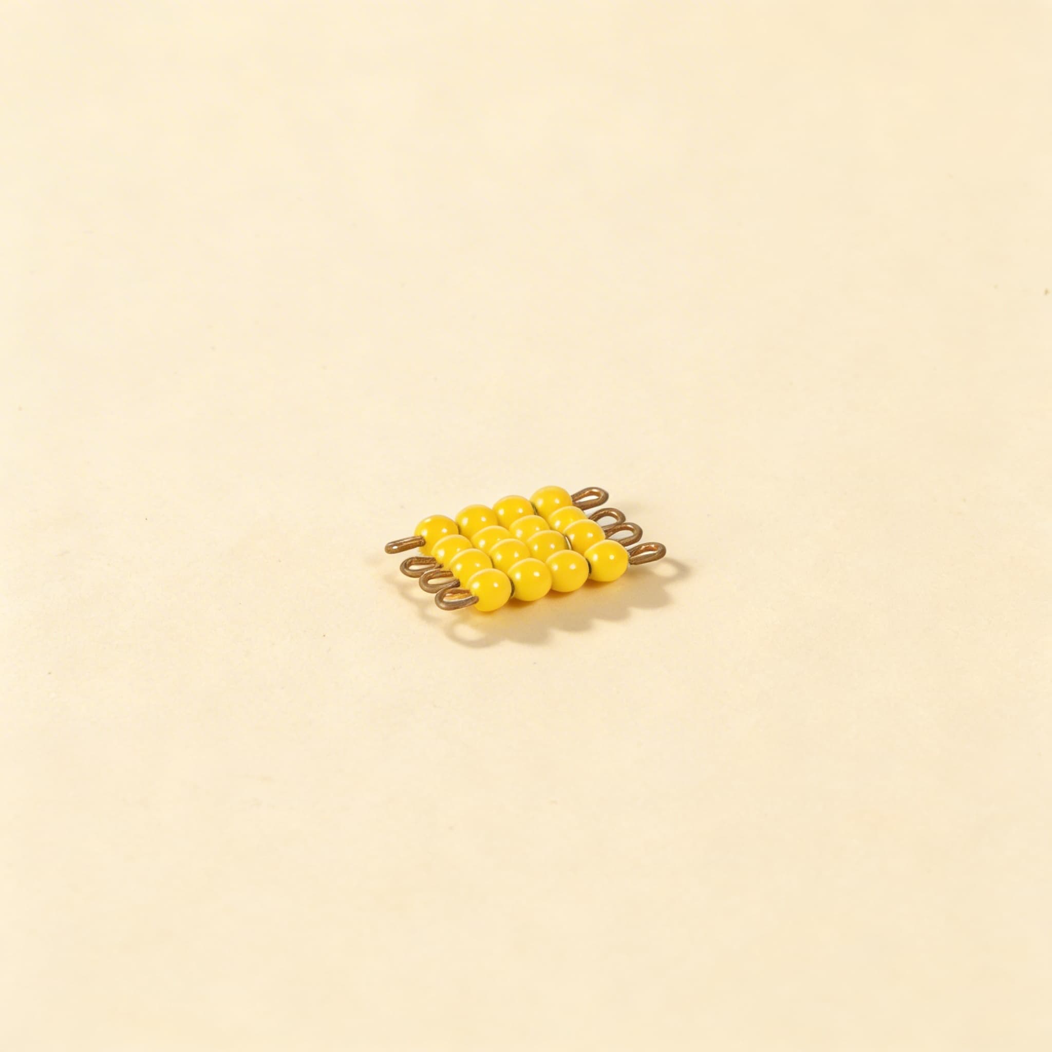 Einzelnes Glasperlenquadrat der 4: Gelb