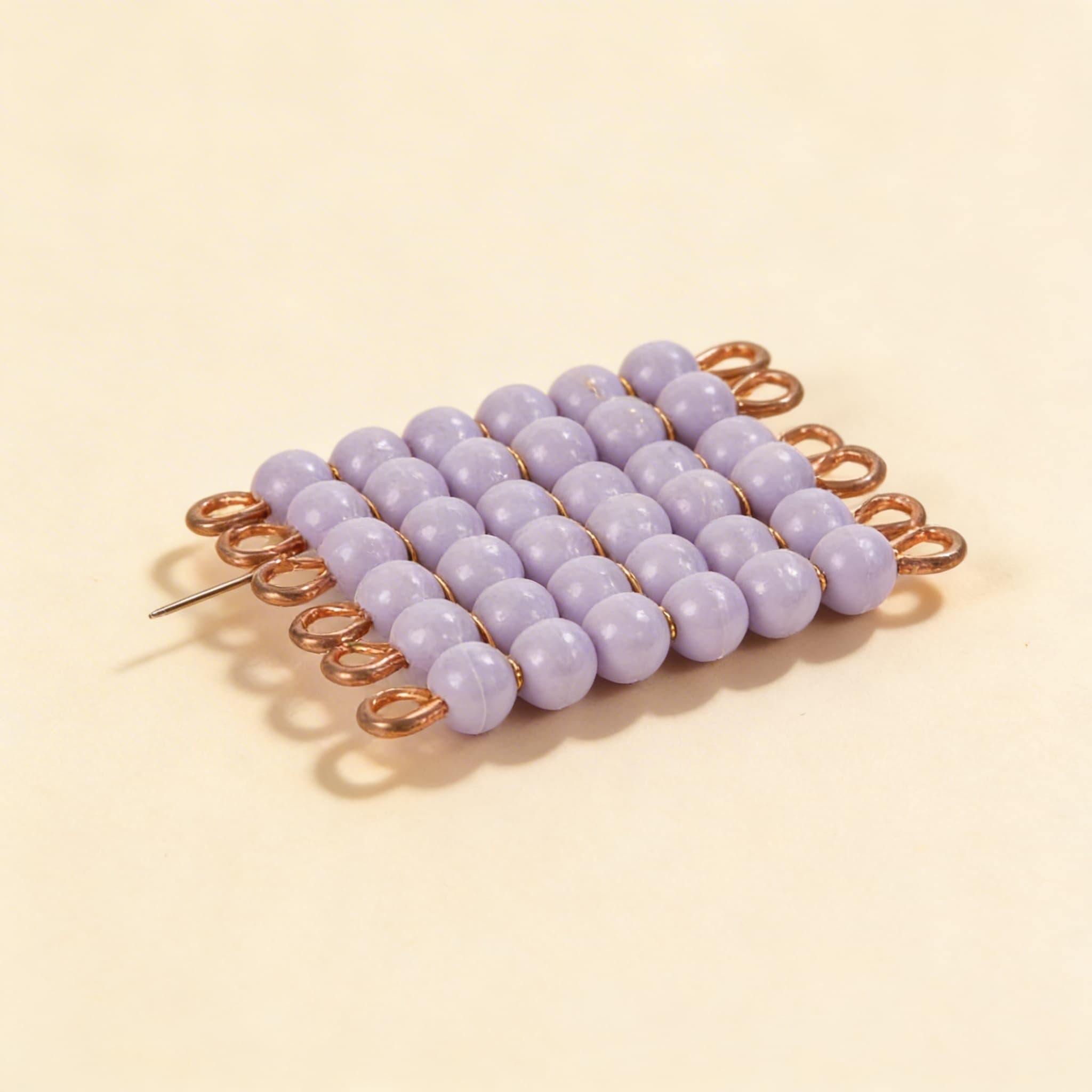 Einzelnes Nylonperlenquadrat der 6: Lila