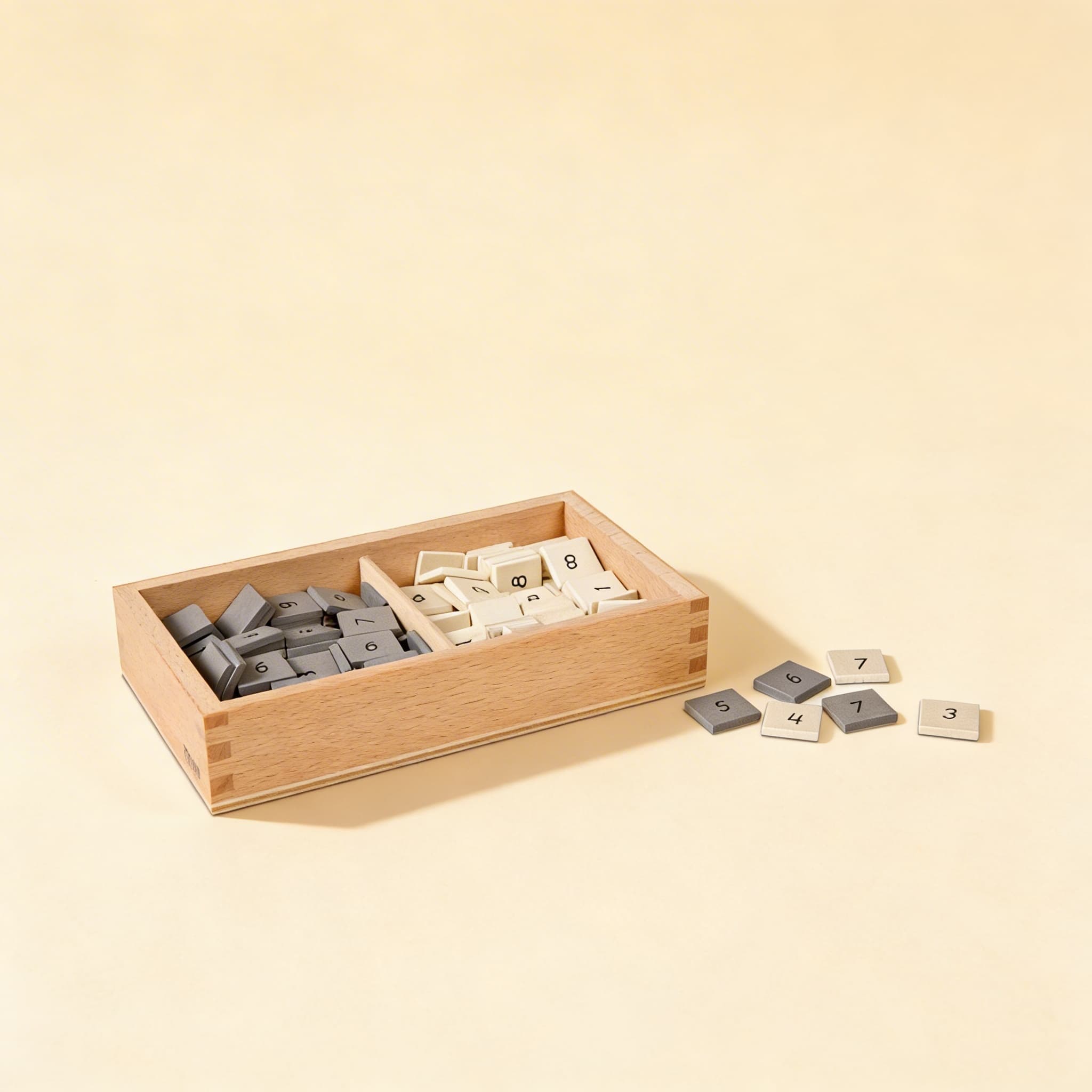 Box s číselnými plátkami — Vizuálne rozlišovanie šedej a bielej — Katalógový pohľad