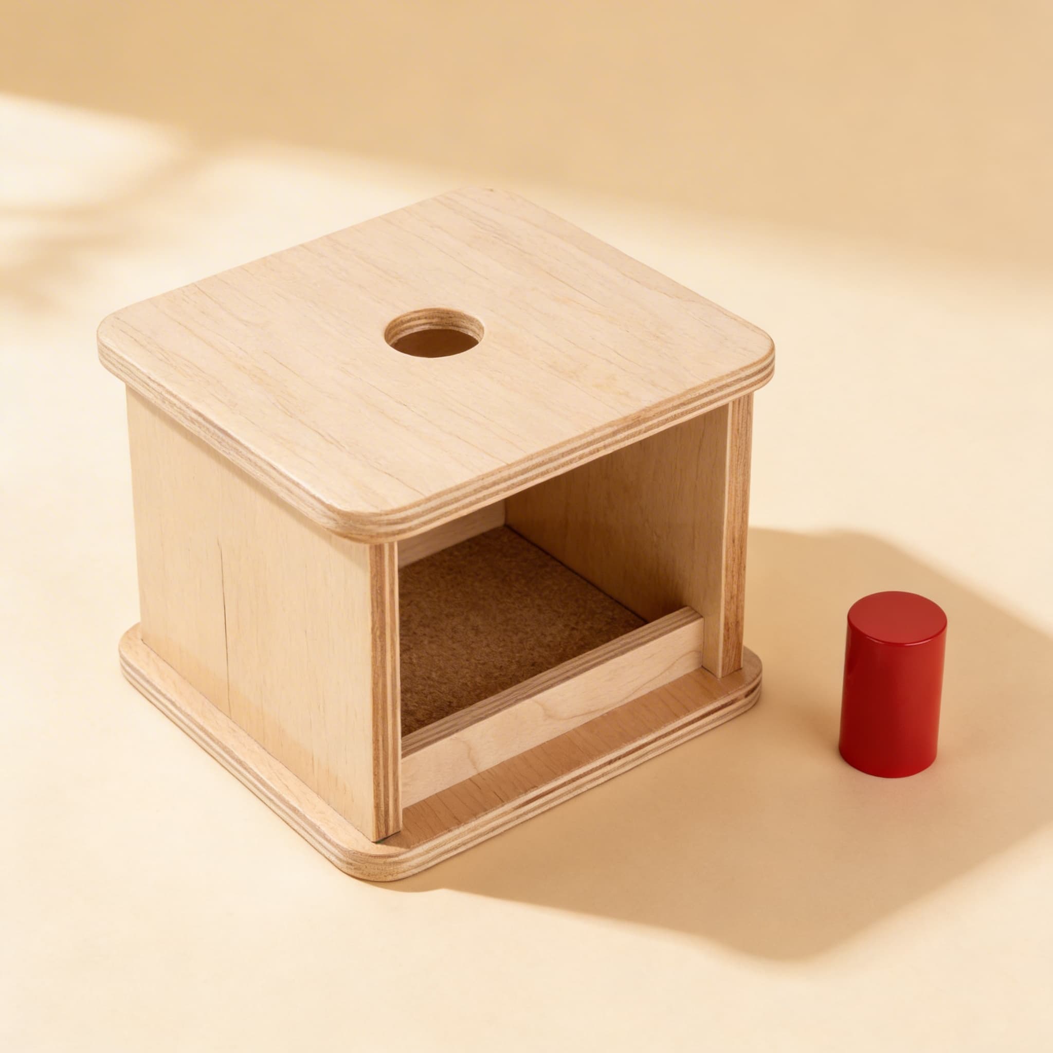 Imbucare Box — Kleiner Zylinder für Objektpermanenz — Seitenansicht