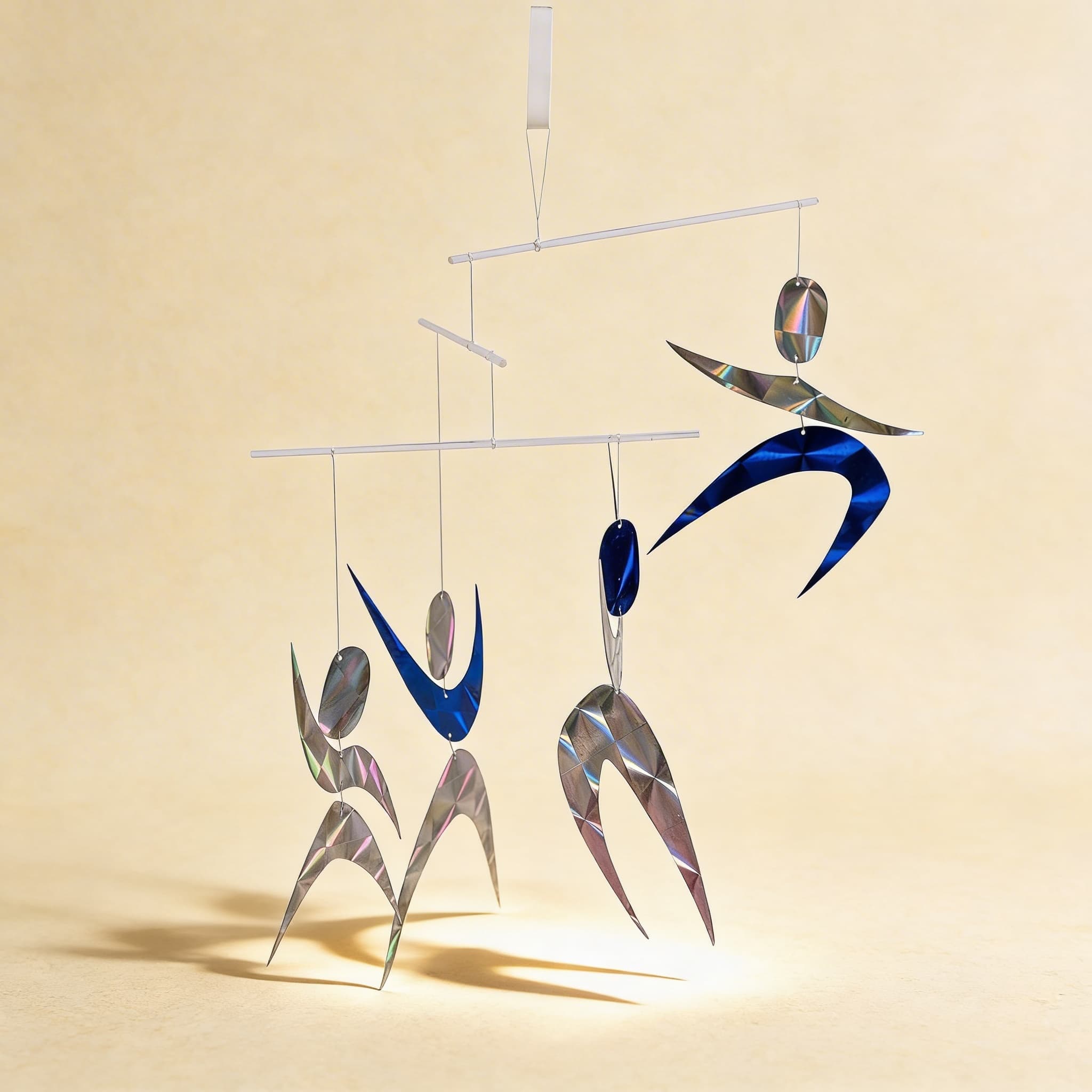 Dancers Mobile — Glass Figures Creating Rainbow Light Reflections