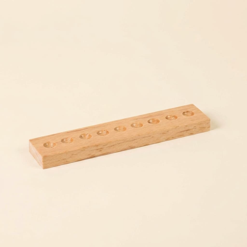 Buchenholzstab mit 9 Löchern - Montessori Material | Faborino
